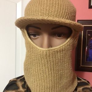 Hat covered with face and nose